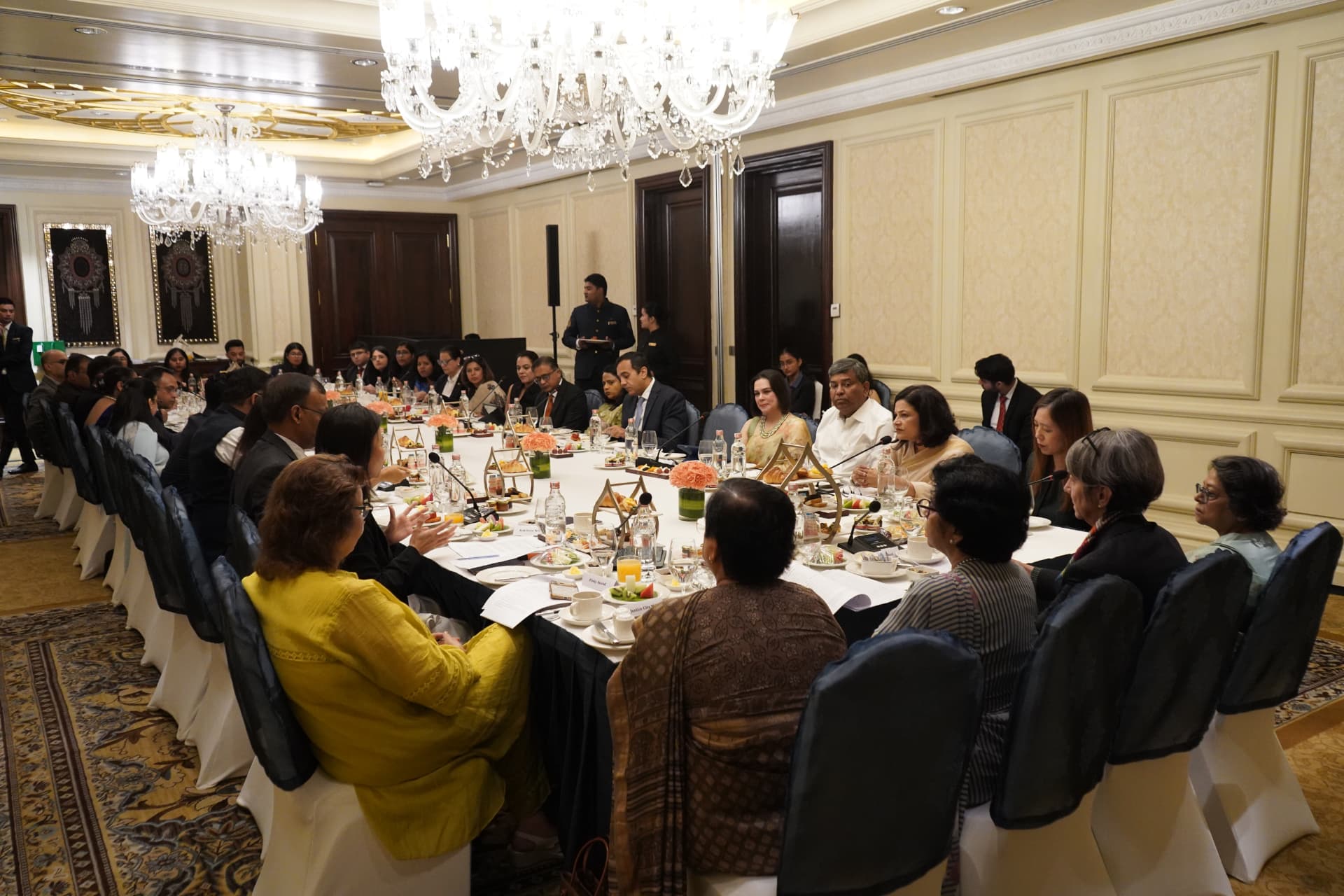Delegates seated around the roundtable at The Leela Palace, New Delhi