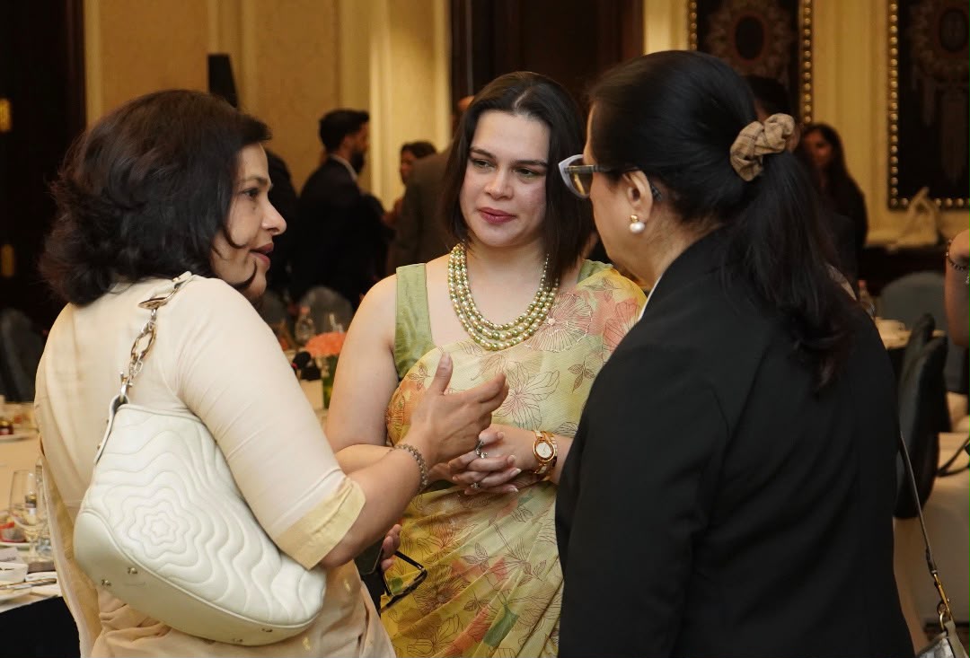 Delegates in conversation at the roundtable