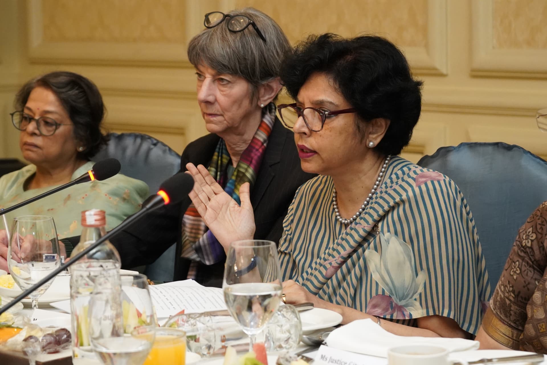 Participants speaking during the construction arbitration roundtable